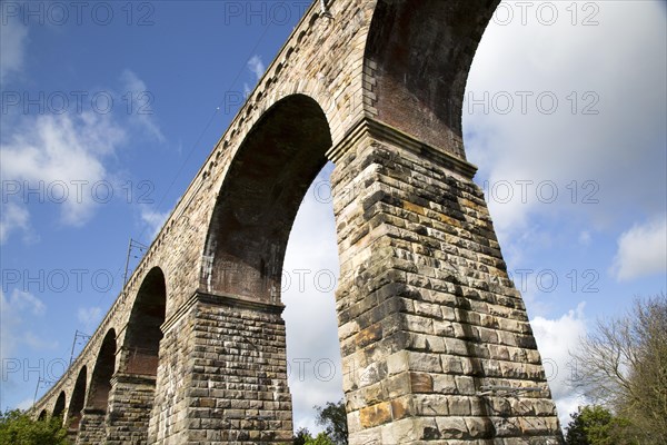 Stone arches of railway viaduct crossing River Tweed, Berwick-upon-Tweed, Northumberland, England, UK