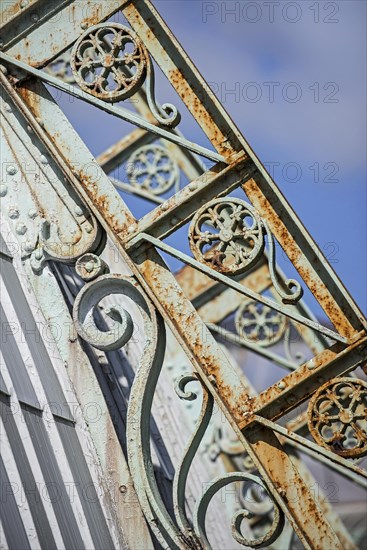 Detail of decorated wrought-iron truss of the Royal Greenhouses of Laeken in Art Nouveau style, designed by Alphonse Balat in the park of the Royal Palace of Laken, Brussels, Belgium, Europe