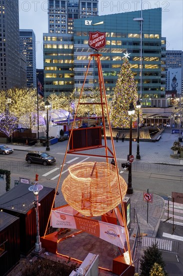 Detroit, Michigan, The world's tallest Salvation Army red kettle in Campus Martius Park. The charity uses hundreds of small red kettles outside stores and in other public places to raise money during the holiday season