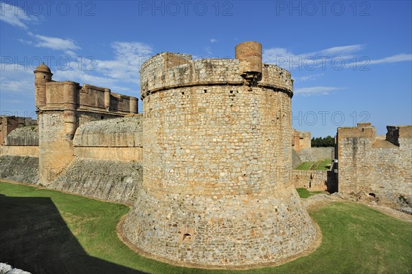 Moat and ramparts of the Catalan fortress Fort de Salses at Salses-le-Chateau, Pyrenees, France, Europe