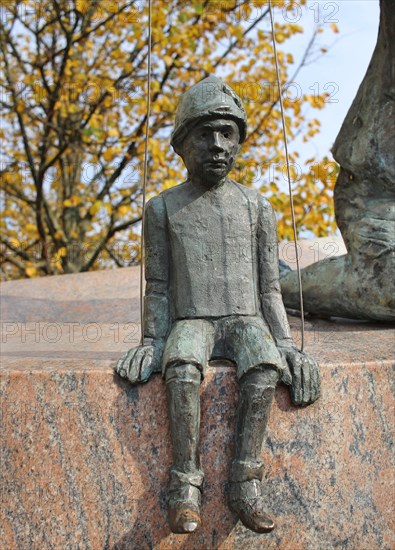 Part of the comic mask sculpture in Bialystok. Stone theater doll. Bialystok, Poland, Europe