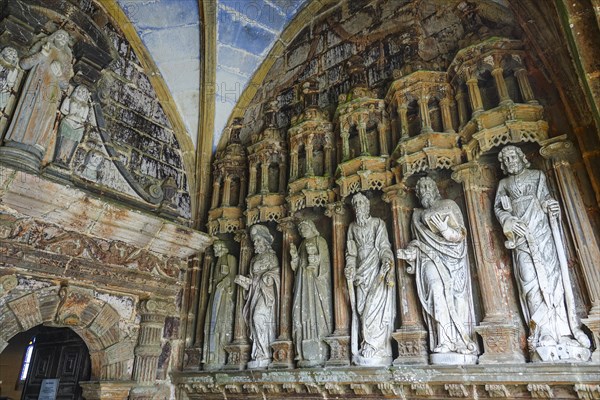 Statues of the apostles in front of the side portal, Enclos Paroissial enclosed parish of Guimiliau, Finistere Penn ar Bed department, Brittany Breizh region, France, Europe