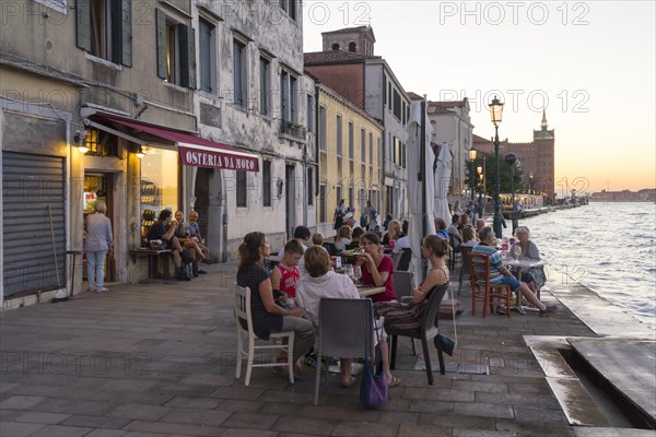 Restaurant on the waterfront of the Guidecca Canal, Dorsoduro district, Venice, Veneto, Italy, Europe