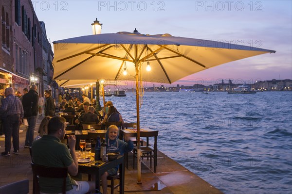 Restaurant on the waterfront of the Guidecca Canal, Dorsoduro district, Venice, Veneto, Italy, Europe