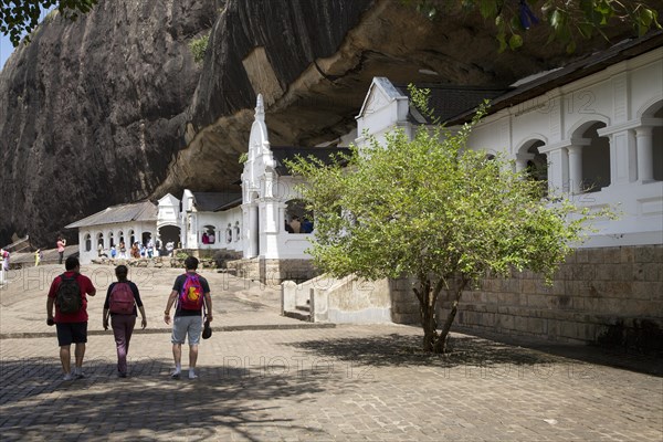 People at Dambulla cave Buddhist temple complex, Sri Lanka, Asia