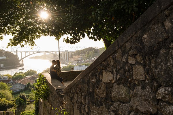 Porto, Portugal, April 18, 2023: Romantic couple and the view of Porto, Portugal, Europe