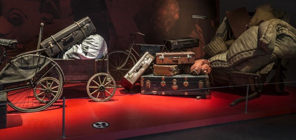 Belongings of fugitives, refugees fleeing from German occupation in the Bastogne War Museum devoted to the Second World War Two Battle of the Bulge in the Belgian Ardennes, Belgium, Europe