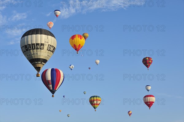 Balloonists, Aeronauts flying in hot-air balloons during ballooning meeting