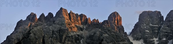 Alpenglow at sunset over the mountain Monte Cristallo in the Dolomites, Italy, Europe