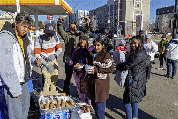 Denver, Colorado, Immigrants, mostly from Venezuela, live in a tent camp near downtown Denver. The city helped about 35, 000 migrants in 2023 with food and temporary shelter, but more continue to arrive daily on buses from the southern border