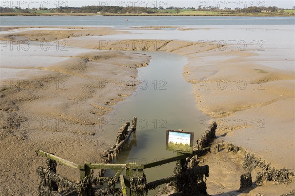 Drainage sluice into the River Deben, Sutton, Suffolk, England, UK