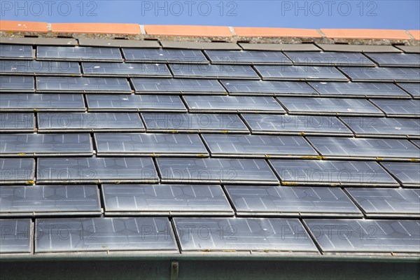 Close up of photovoltaic roof tiles on building, Kynance Cove, Cornwall, England, UK