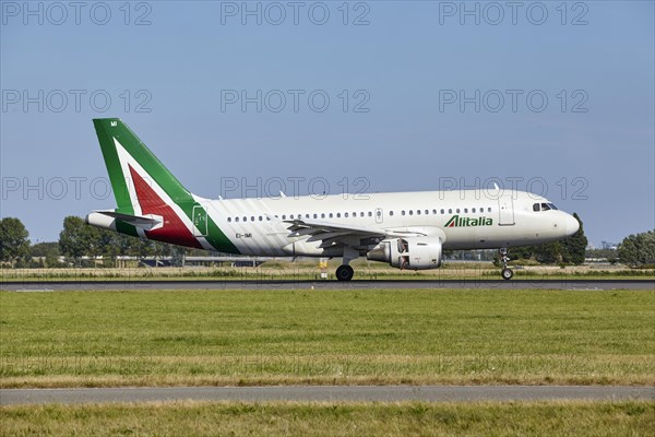 ITA Airways Airbus A319-112 with registration EI-IMI lands on the Polderbaan, Amsterdam Schiphol Airport in Vijfhuizen, municipality of Haarlemmermeer, Noord-Holland, Netherlands