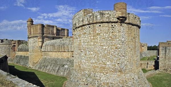 Moat and ramparts of the Catalan fortress Fort de Salses at Salses-le-Chateau, Pyrenees, France, Europe