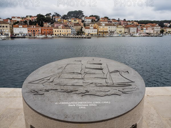 Relief of a sailing ship, memory of famous sailors, harbour of Mali Losinj, island of Losinj, Kvarner Gulf Bay, Croatia, Europe