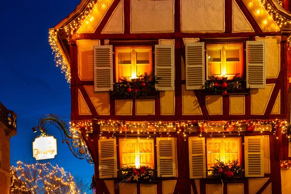 Historic half-timbered house with Christmas lights, Christmas decoration, Christmas market, historic town, Colmar, Alsace, France, Europe