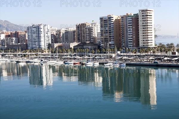 Apartment blocks and yachts in marina of Muelle Uno port development, city of Malaga, Spain, Europe