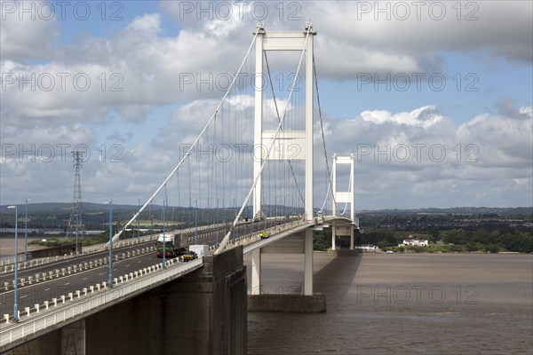 The old 1960s Severn bridge crossing between Aust and Beachley, Gloucestershire, England, UK looking west