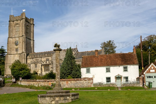 Historic buildings cottage and church of Saint Michael, Aldbourne, Wiltshire, England, UK