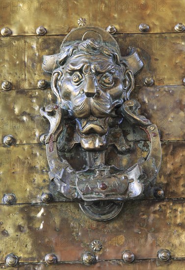 Detail of historic brass door knocker Cordoba, Spain, Europe