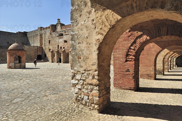 Inner court and well of the Catalan fortress Fort de Salses at Salses-le-Chateau, Pyrenees, France, Europe