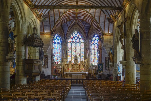Nave, main altar and choir of the church of Saint Germain, Enclos Paroissial de Pleyben enclosed parish from the 15th to 17th centuries, Finistere department, Brittany region, France, Europe