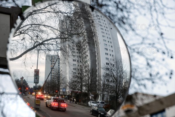 Reflection of high-rise buildings in Gropiusstadt. The rise in rents in German cities has increased again in the past year, Berlin, 16.01.2023