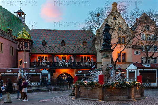 Historic house with Christmas decoration, fountain, illuminated, old department stores', Colmar, Alsace, France, Europe