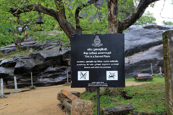 Notice at Gal Viharaya, UNESCO World Heritage Site, the ancient city of Polonnaruwa, Sri Lanka, Asia