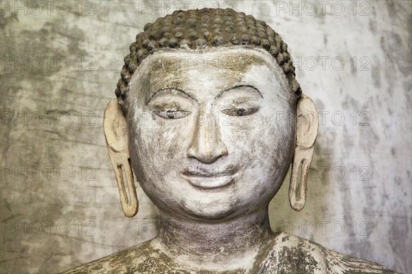 Buddha figure inside Dambulla cave Buddhist temple complex, Sri Lanka, Asia