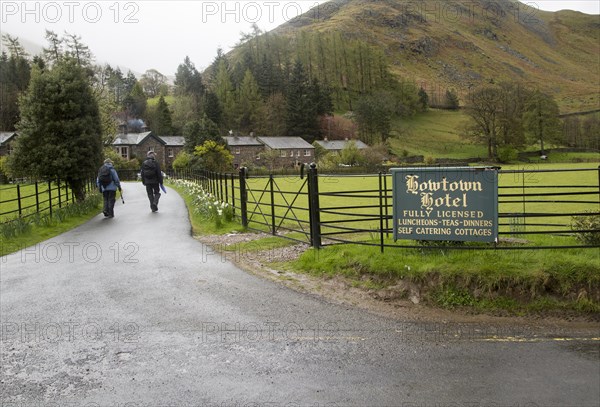 People walking near Howtown Hotel, Ullswater, Cumbria, England, UK