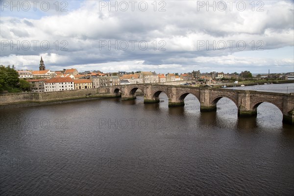 Historic stone bridge crossing River Tweed, Berwick-upon-Tweed, Northumberland, England, UK