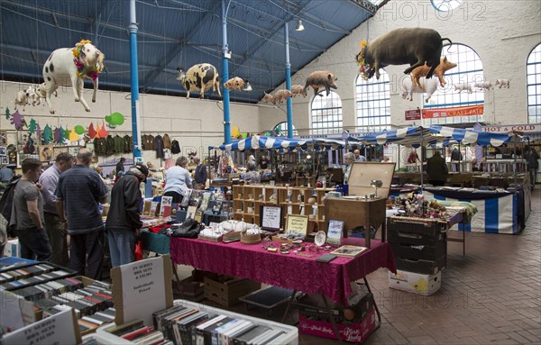 Flea market inside Market Hall building, Abergavenny, Monmouthshire, South Wales, UK