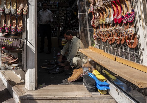 Shoe shops and craftsmen in the Al Fahidi neighbourhood, Dubai, United Arab Emirates, Asia