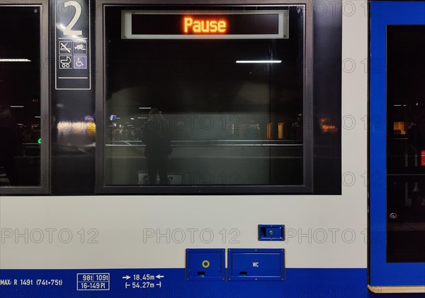 Break, illuminated sign on a local train at the main station in the evening, Duesseldorf, North Rhine-Westphalia, Germany, Europe