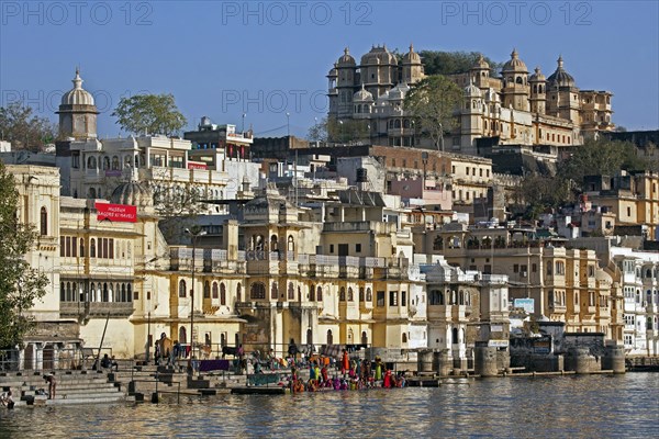 Women bathing in the Ahar River in the city of Udaipur, City of Lakes, Rajasthan, India, Asia