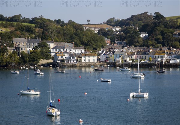 Yachts at moorings on River Fal, Flushing, Cornwall, England, UK