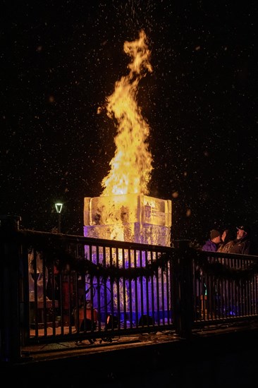 Detroit, Michigan, The Fire & Ice Festival on the Detroit Riverwalk featured ice carvings, one of which, and Ice Tower, was set on fire