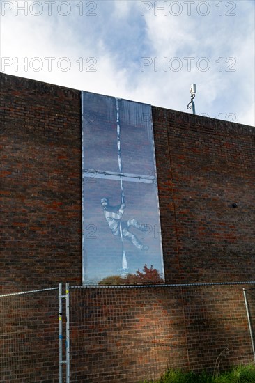 Banksy artwork of prisoner escaping on walls of Reading jail, Reading, Berkshire, England, UK