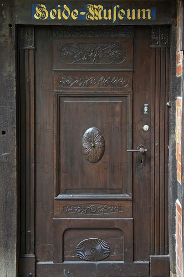 Old wooden door of the Heidemuseum, Rischmannshof Heath Museum, open air museum at Walsrode, Lueneburg Heath, Lunenburg Heathland, Lower Saxony, Germany, Europe