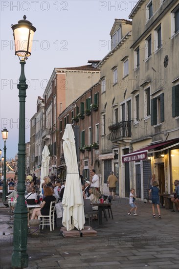 Restaurant on the waterfront of the Guidecca Canal, Dorsoduro district, Venice, Veneto, Italy, Europe