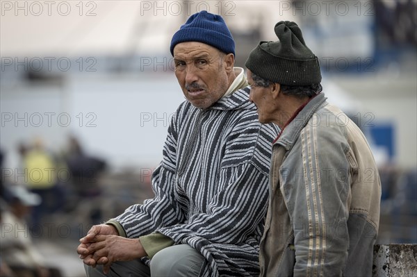 Portrait, Men sitting in the harbour, Essaouira, Morocco, Africa