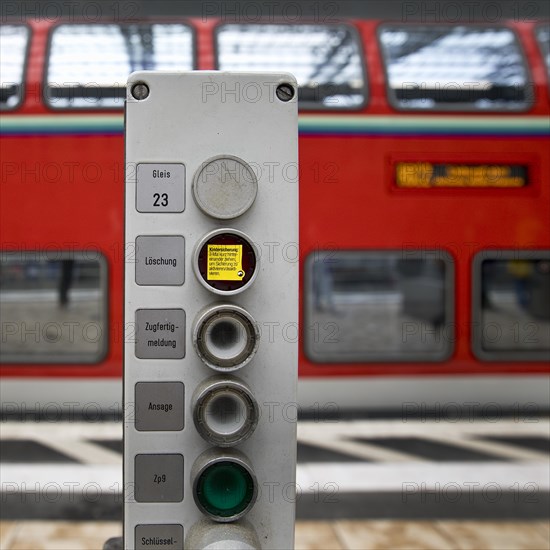 Railway technology on track 23 in front of a blurred double-decker local train, Frankfurt am Main Central Station, Hesse, Germany, Europe