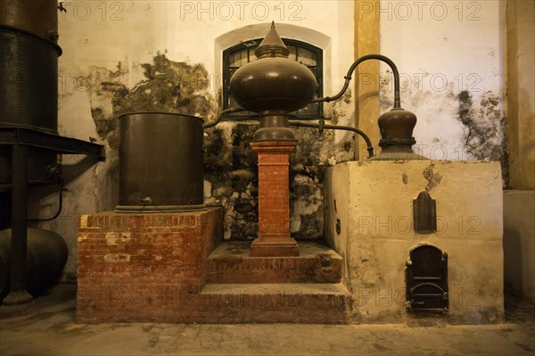 Old distilling equipment for brandy cognac production in Gonzalez Byass bodega, Jerez de la Frontera, Cadiz province, Spain, Europe