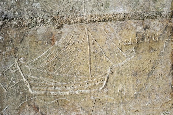 Old graffiti of galleon sailing ship carved on rampart wall of the citadel at Brouage, Hiers-Brouage, Charente-Maritime, France, Europe