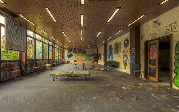 An abandoned hallway with colourful graffiti, destroyed furniture and glass windows, Biotech, abandoned university, Lost Place, Sint-Genesius-Rode, Belgium, Europe
