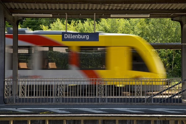 Passing railcar of the Hessische Landesbahn HLB at the railway station in Dillenburg, Hesse, Germany, Europe