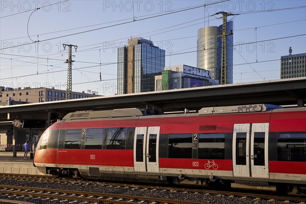 Local train at the main station in front of skyscrapers, Dortmund, Ruhr area, Germany, Europe
