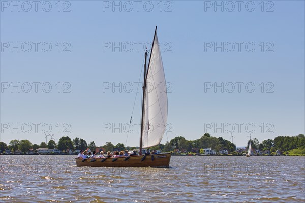 Auswanderer, traditional wooden sailboat sailing with tourists on Steinhuder Meer, Lake Steinhude, Lower Saxony, Niedersachsen, Germany, Europe