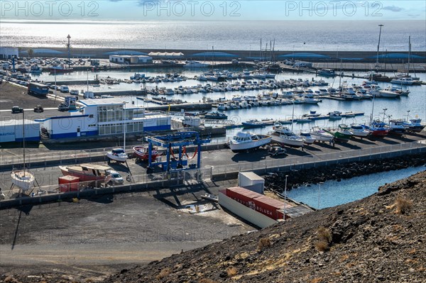 View of harbour basin old marina harbour for sports boats yachts yachts of holiday resort Morro Jable, in the background harbour wall, behind it Atlantic Ocean, Morro Jable, Jandia peninsula, Fuerteventura, Canary Islands, Canary Islands, Spain, Europe